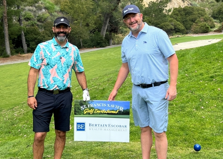 David and Sean at a golf tournament